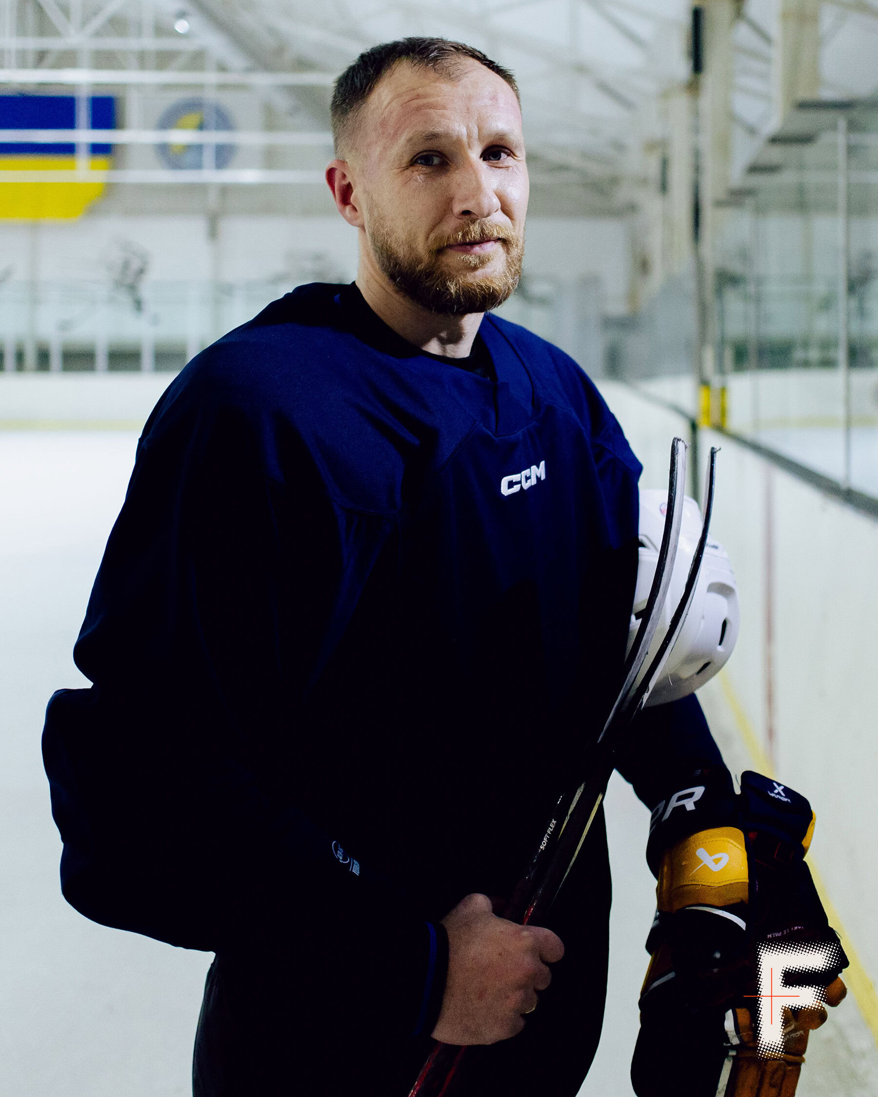 Leaving their prosthetics in the stands, veterans enter the ice rink